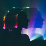 Blurred portrait of a woman taken with long exposure, concept of surrealism and spirituality.